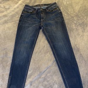 White House Black Market skimmer jeans with leather details